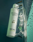 Lifestyle shot of Eau d'Italie Body Milk (200 ml) with body milk submerged in water
