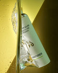 Lifestyle shot of Eau d'Italie Conditioner (200 ml) submerged in water