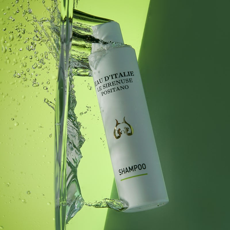 Lifestyle shot of Eau d'Italie Shampoo (200 ml) submerged in water