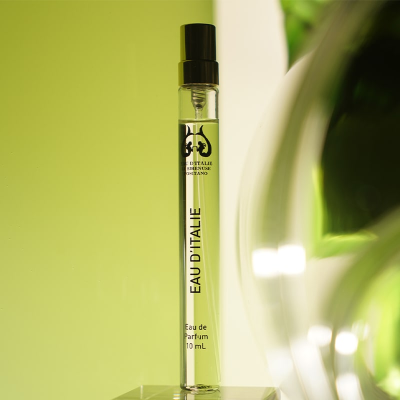 Eau d'Italie Eau de Parfum Travel Spray beauty shot with light green background