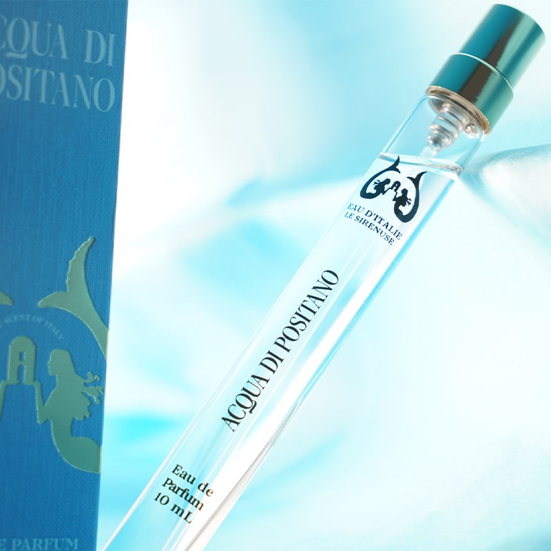 Eau d'Italie Acqua di Positano Eau de Parfum Travel Spray  beauty shot on blue background