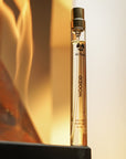 ALTAIA Woo(e)d Eau de Parfum (10 ml) - product shown near flames