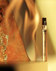 ALTAIA Woo(e)d Eau de Parfum (10 ml) - product shown near flames