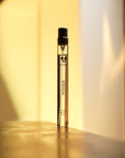 ALTAIA Woo(e)d Eau de Parfum (10 ml) - product shown in warm light