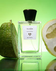 Beauty shot of ALTAIA Yu Son Eau de Parfum with fruit in the background