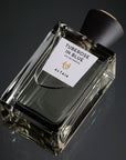 Beauty shot of ALTAIA Tuberose in Blue Eau de Parfum - 100 ml shown top view with a black background