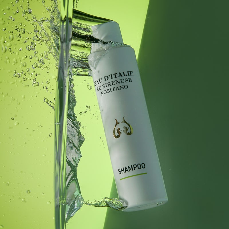 Lifestyle shot of Eau d&#39;Italie Shampoo (200 ml) submerged in water