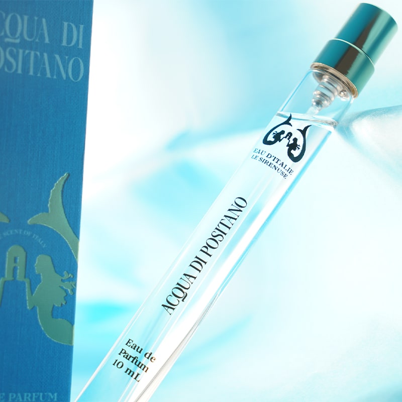 Eau d&#39;Italie Acqua di Positano Eau de Parfum Travel Spray  beauty shot on blue background