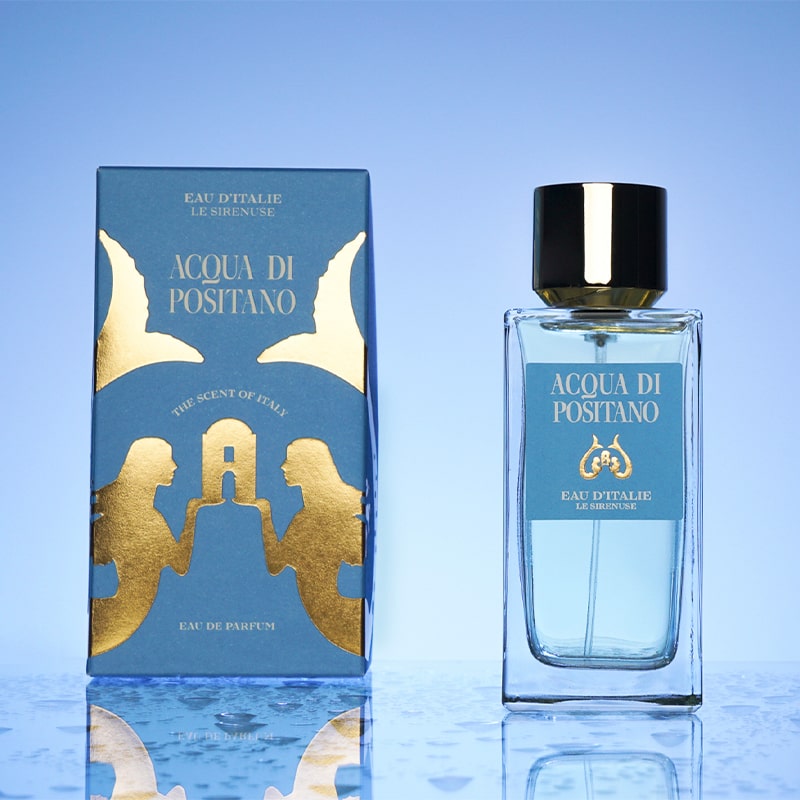 Eau d'Italie Acqua di Positano Eau de Parfum Spray (100 ml) with box on blue background
