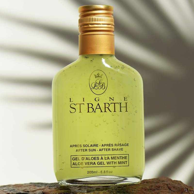 Ligne St. Barth Aloe Vera Gel with Mint (6.8 oz) on stone with a shadow of a palm leaf in the background