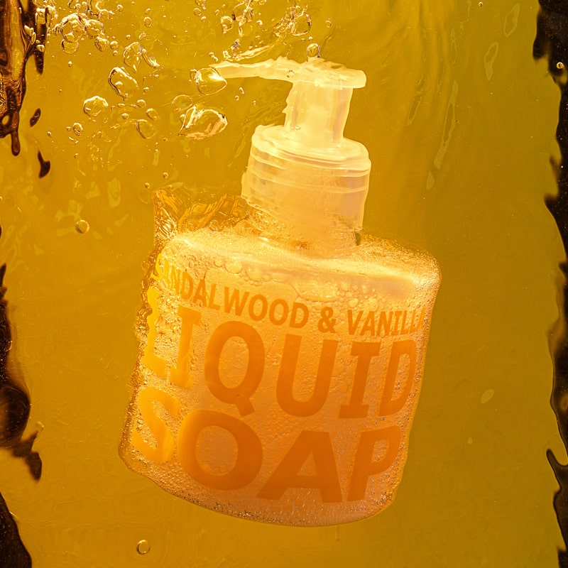 Lifestyle shot of Eau d&#39;Italie Liquid Soap Sandalwood &amp; Vanilla (300 ml) under water