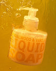 Lifestyle shot of Eau d'Italie Liquid Soap Sandalwood & Vanilla (300 ml) under water