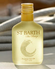 Beauty shot of Ligne St. Barth Premium Care Oil 6.8 oz with ropes in the background