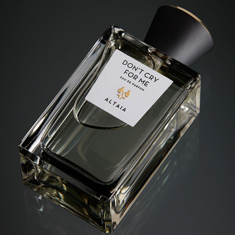 Beauty shot of ALTAIA Don&#39;t Cry For Me Eau de Parfum 100 ml shown top view with black background