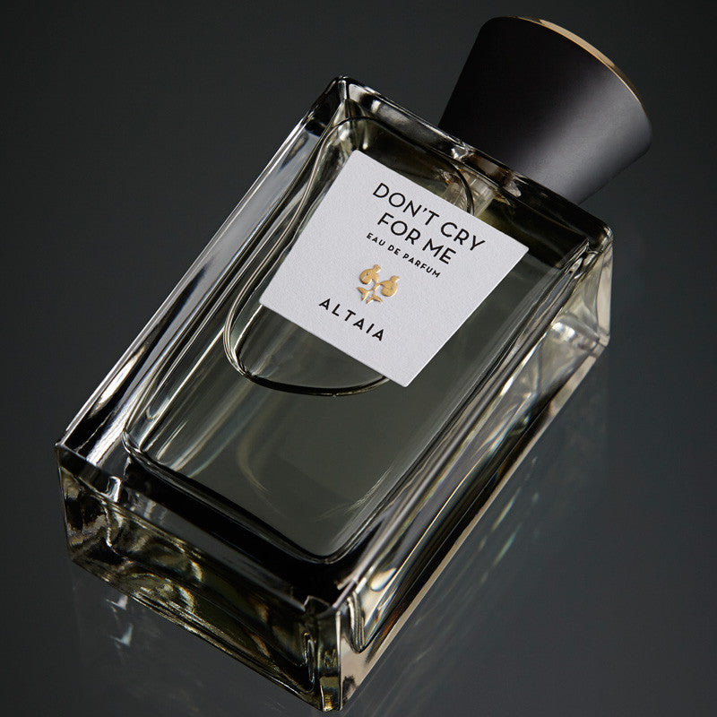 Beauty shot of ALTAIA Don't Cry For Me Eau de Parfum 100 ml shown top view with black background