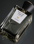 Beauty shot of ALTAIA Don't Cry For Me Eau de Parfum 100 ml shown top view with black background