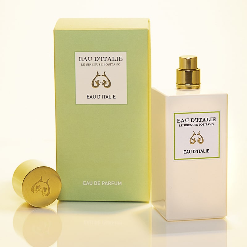 Lifestyle shot of Eau d&#39;Italie Eau de Parfum Spray (100 ml) and box with top off of the bottle