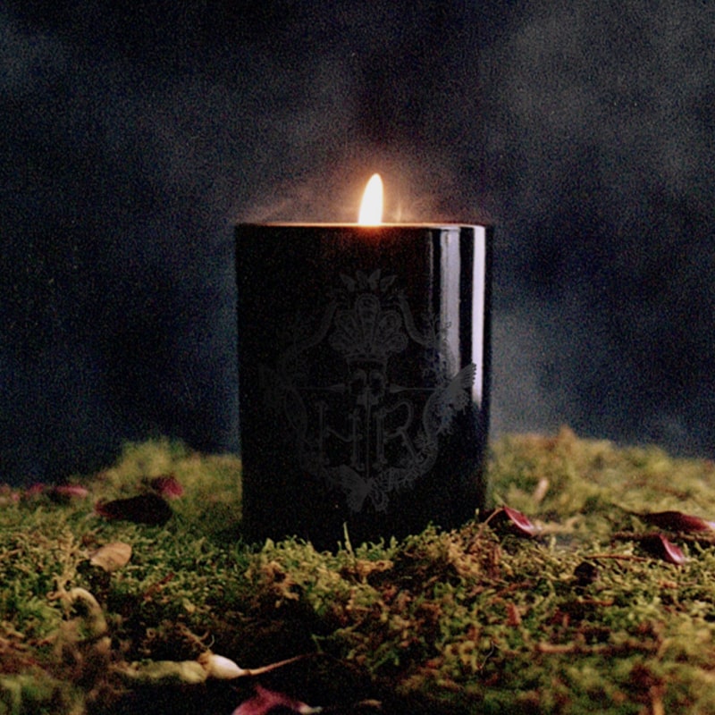 Lifestyle shot of Harris Reed Next Chapter, Neroli Candle (10 oz) shown burning