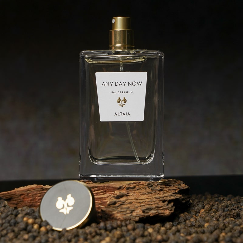 ALTAIA Any Day Now Eau de Parfum - Product shown on top of log, with cap off