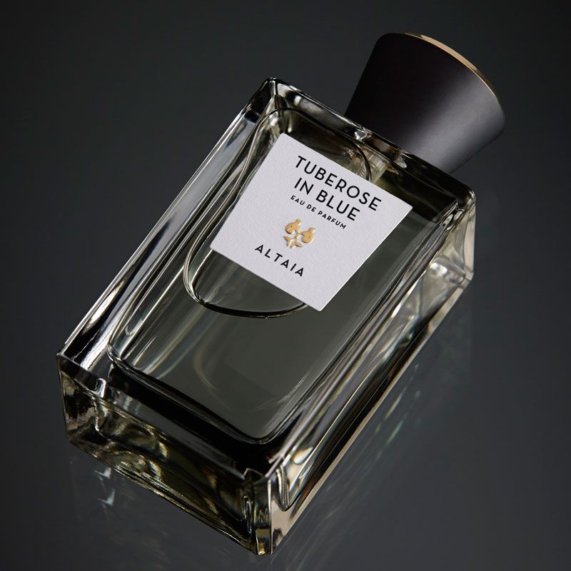 Beauty shot of ALTAIA Tuberose in Blue Eau de Parfum - 100 ml shown top view with a black background