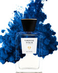 Beauty shot of ALTAIA Tuberose in Blue Eau de Parfum - 100 ml with blue liquid in the background 